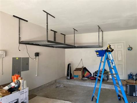 how to elevate boxes in storgae metal|How to Install Overhead Garage Storage Racks: A.